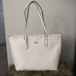 white COACH purse